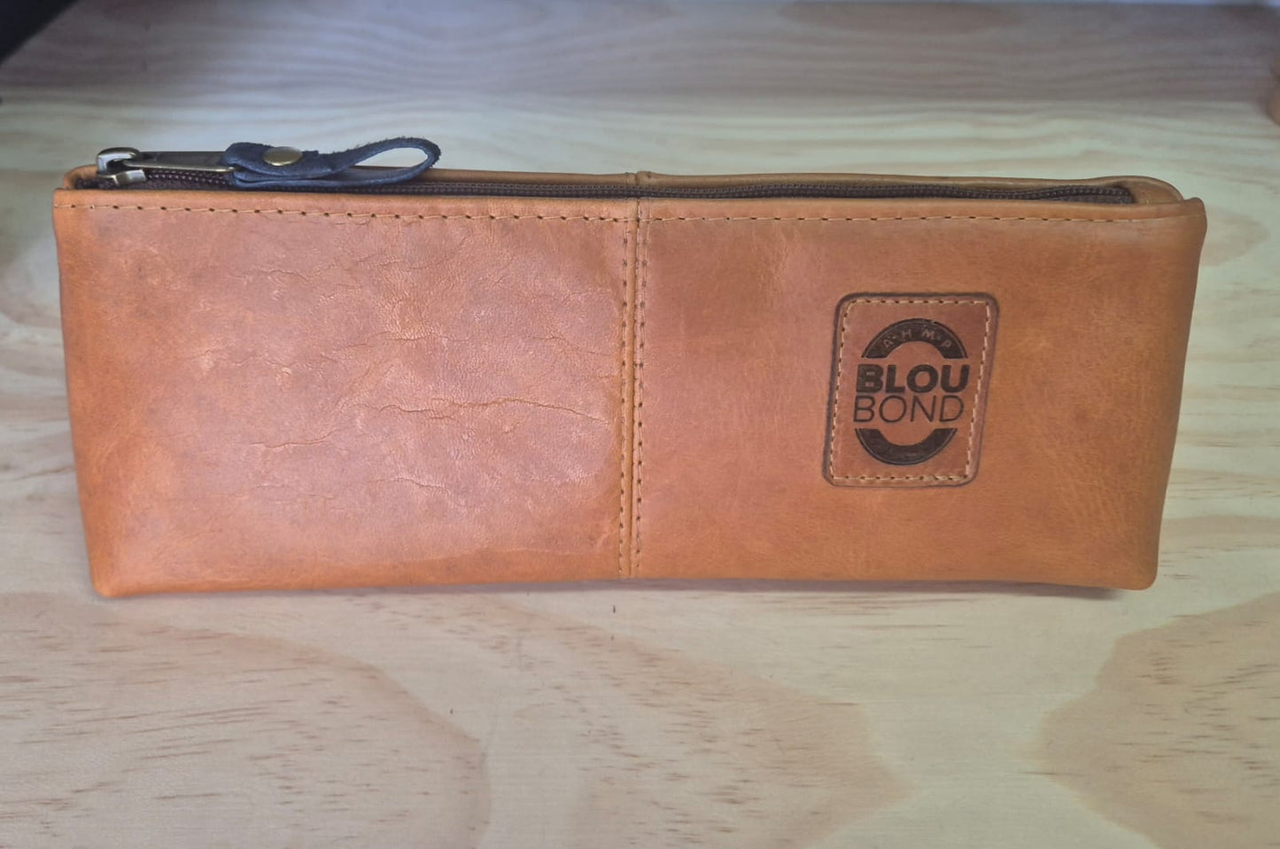 Blou Bond Leer Pennesakkie